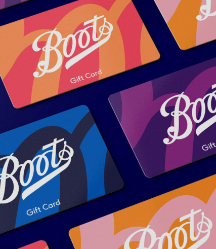 Different coloured Boots gift cards on a purple background