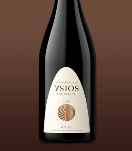 ysios - bottle of 2015 Rioja on a brown gradient background