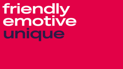 The words 'friendly emotive unique' written on a red background