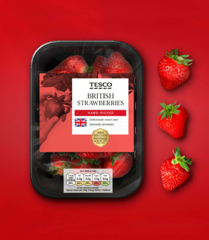 Tesco - a small punnet of strawberries placed on a red background