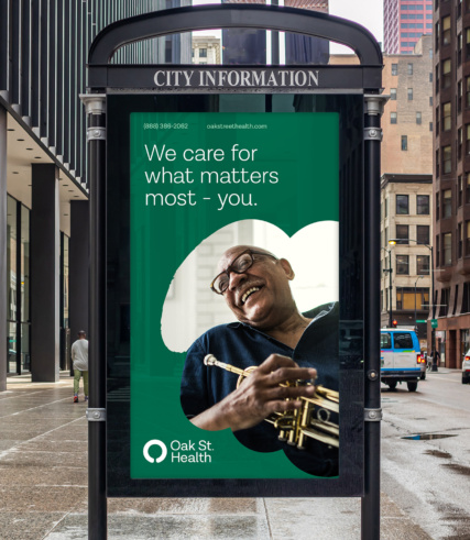 "Oak St. Health advertisement in city enviroment."